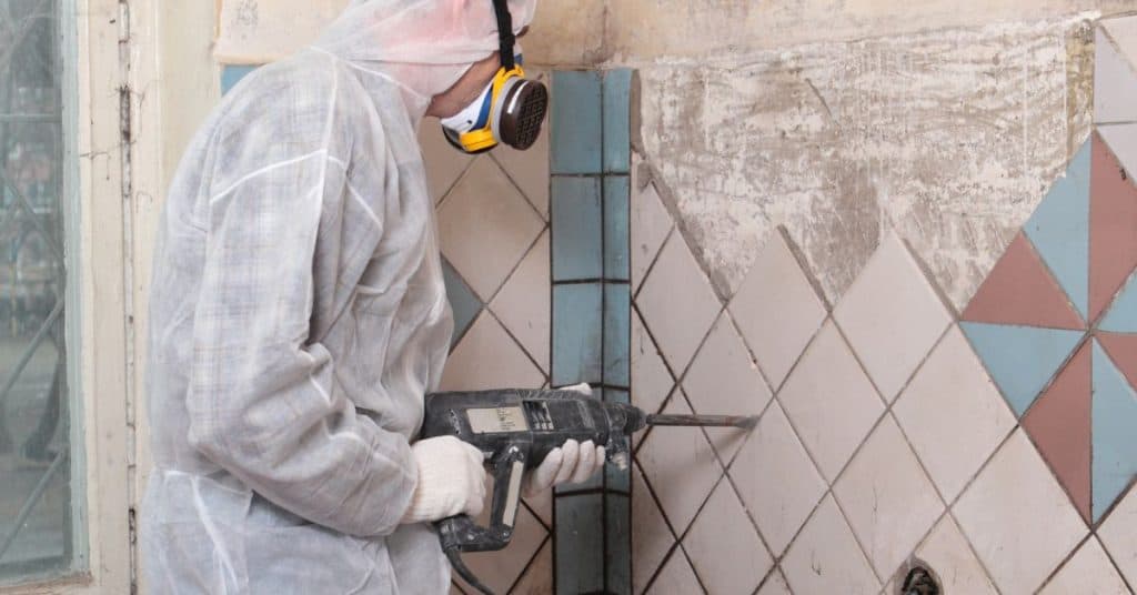 how to remove backsplash tile without damaging drywall