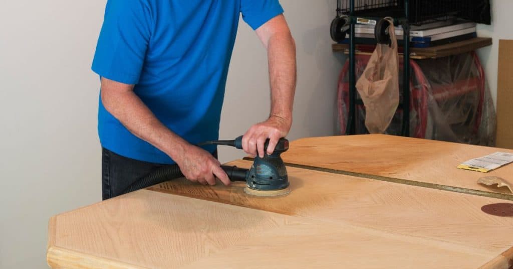 How to refinish a table that is not real wood
