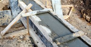 Can you pour concrete over dirt? - craftingwithconcrete
