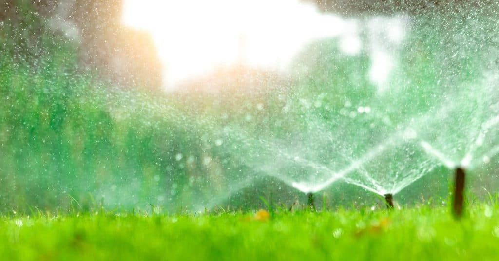 how deep to bury sprinkler lines