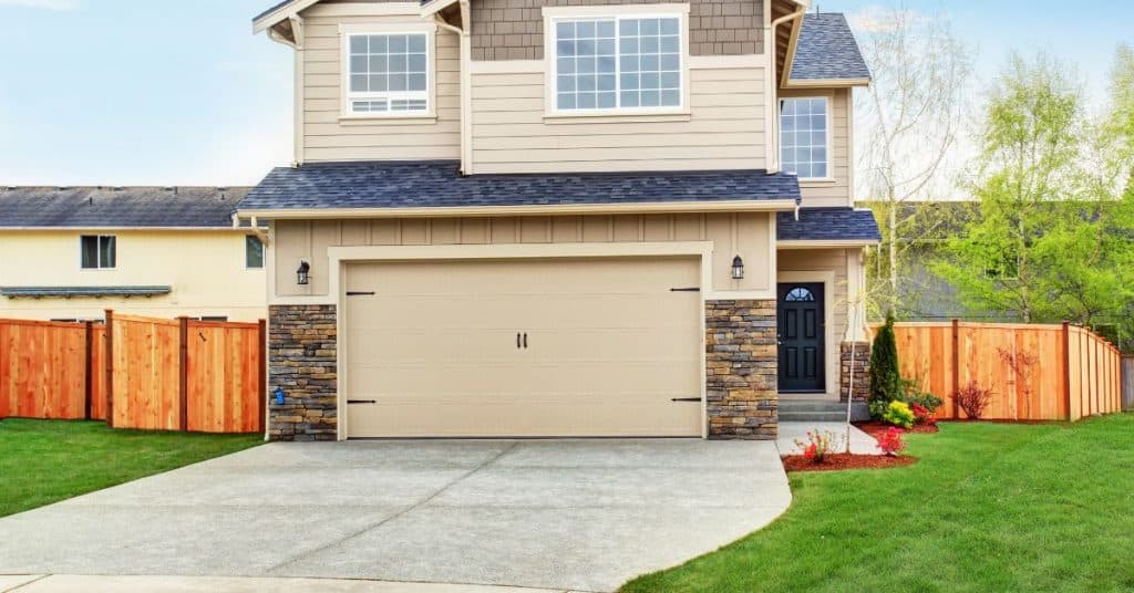 How long should concrete cure before driving on it