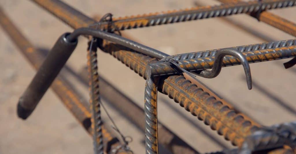 How far should rebar be from edge of concrete