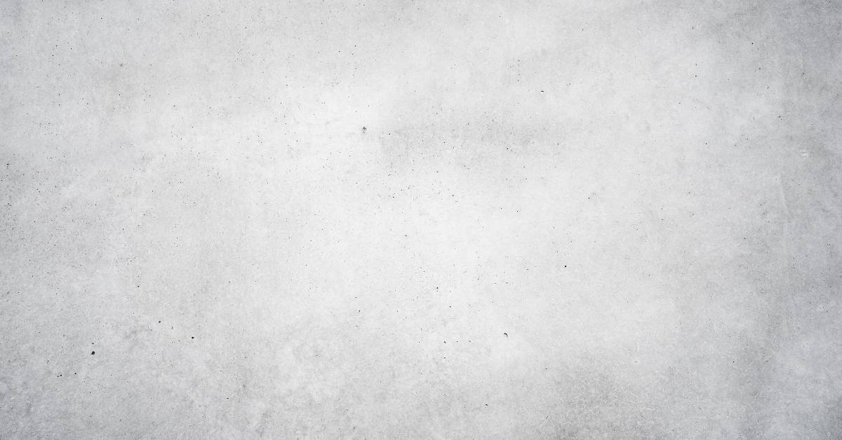 Close-up of concrete surface with subtle speckled texture.