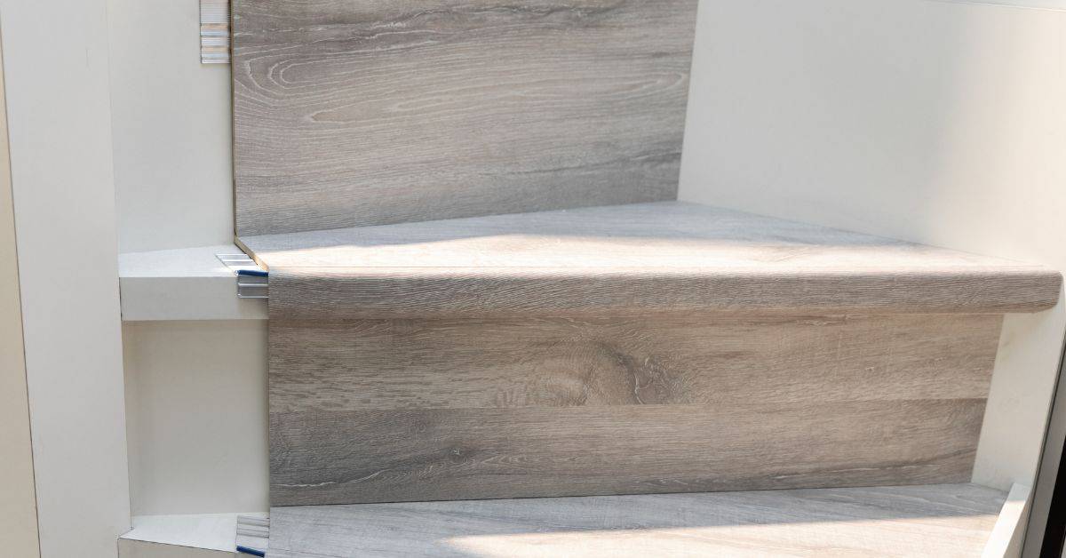 Close-up of engineered wood flooring installed on stairs