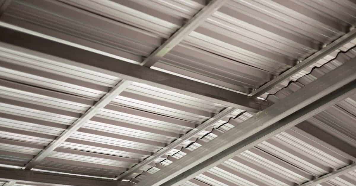 closeup of metal roof panels and supporting beams