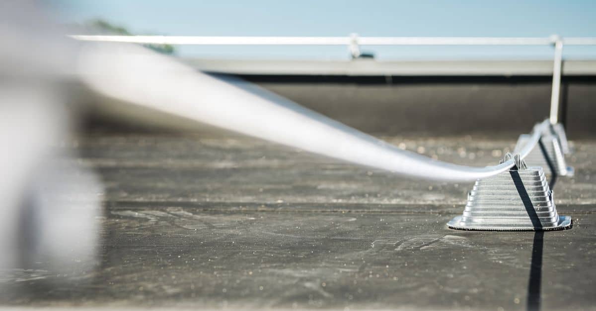 Close up of roof safety guard rail system on flat rooftop