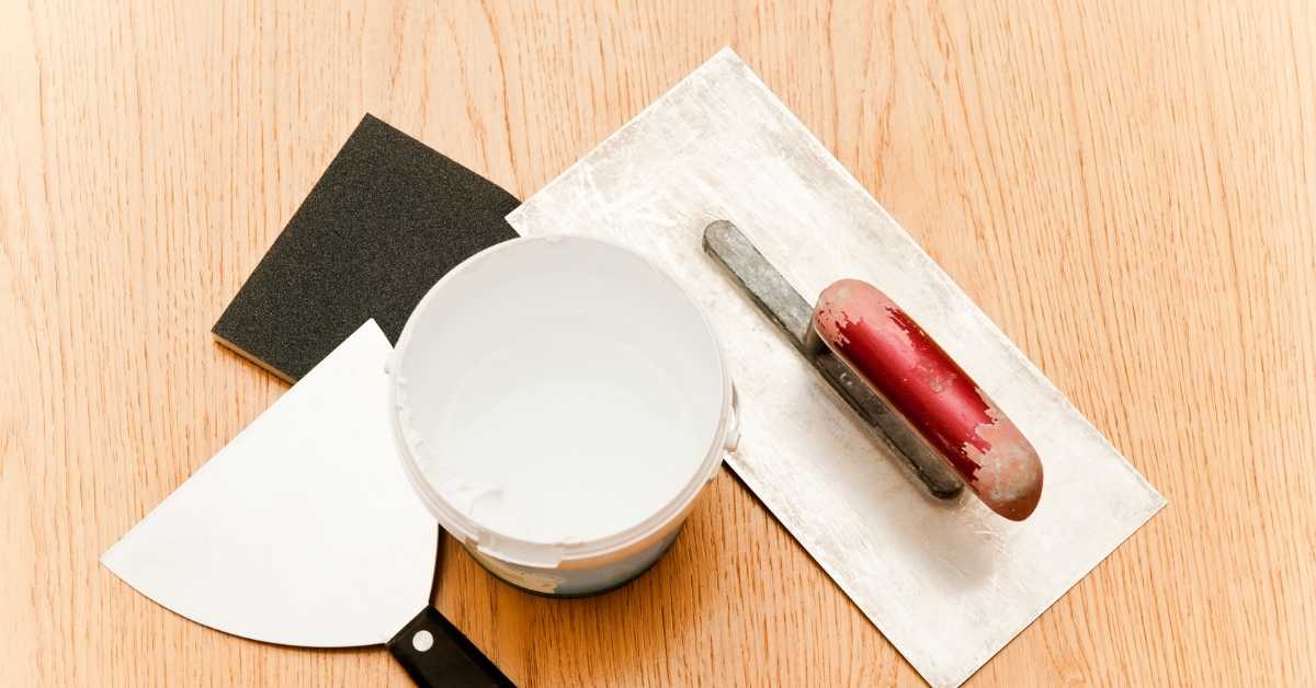 Plastering tools including trowel putty knife sponge and bucket
