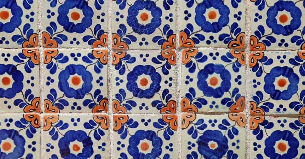 Decorative blue and orange floral ceramic wall tiles