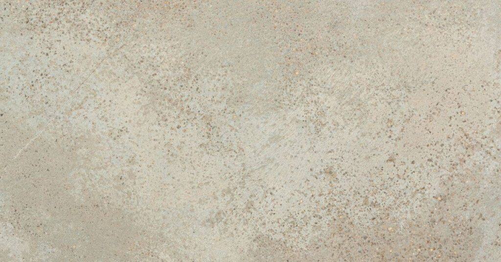 Close-up of concrete countertop surface with pinholes and texture