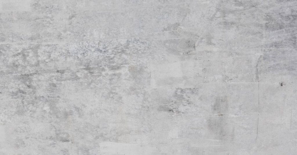 Close-up of rough gray concrete wall surface