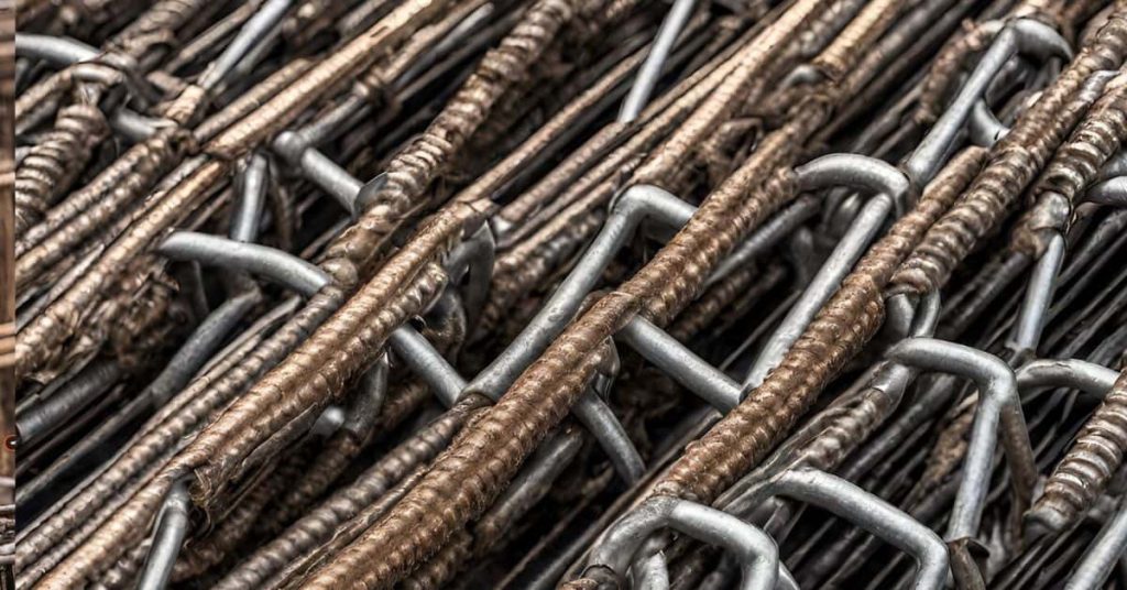 Close-up of rusted steel rebar with metal ties