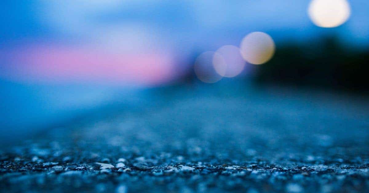 Closeup of textured concrete surface with blurred background