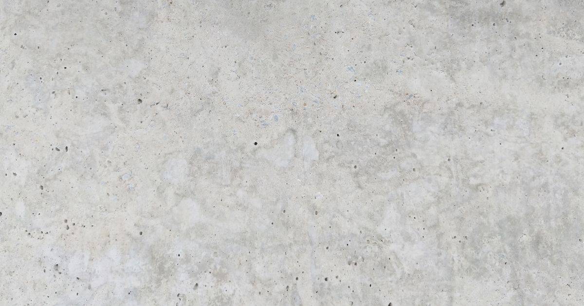close-up of concrete surface with small voids and rough texture