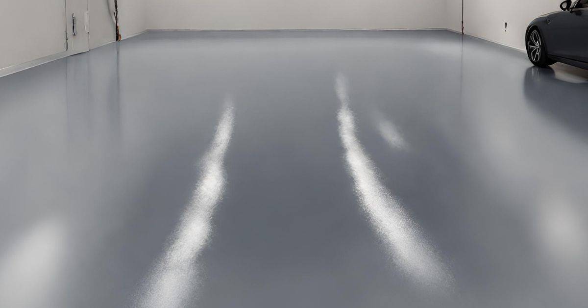 smooth gray epoxy-coated concrete floor in empty garage