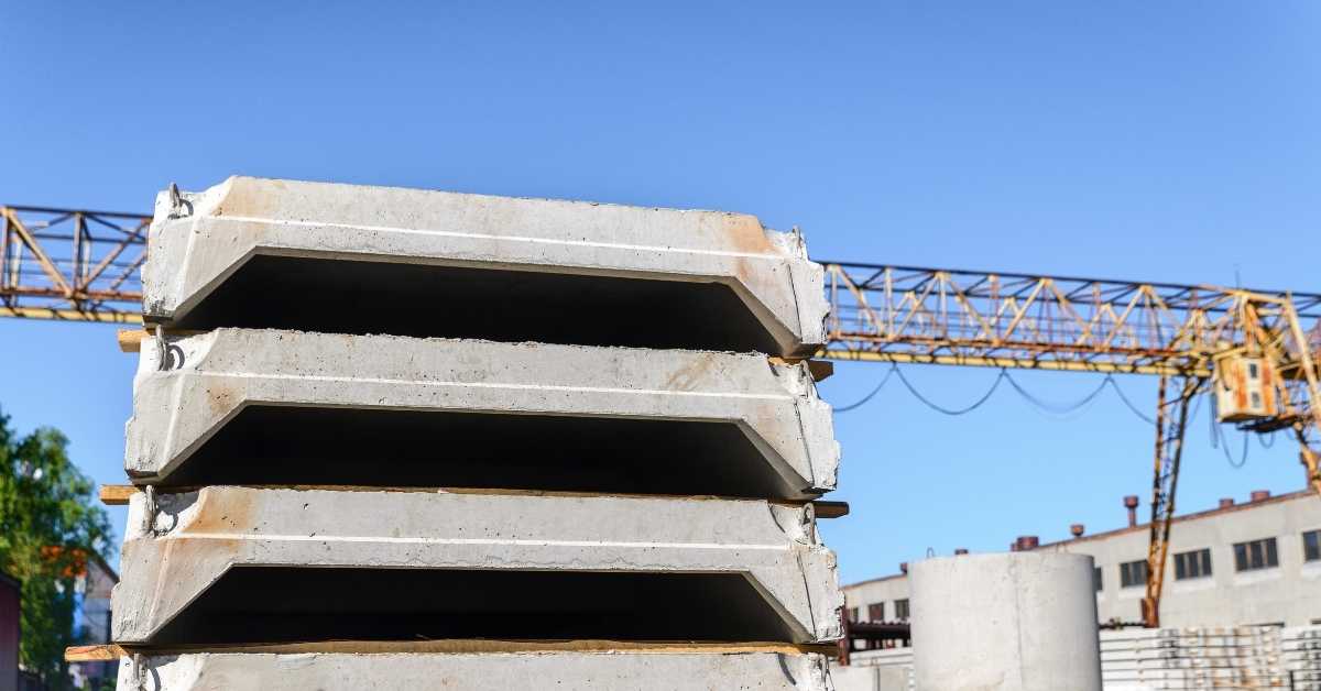 Stacked precast concrete slabs at construction site