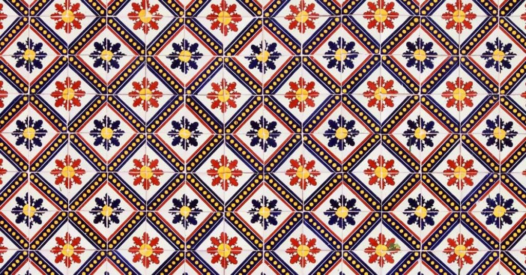 Decorative ceramic tiles with red and blue floral patterns