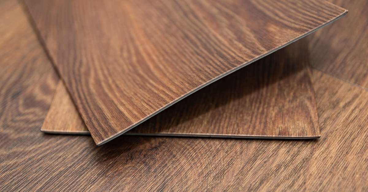 closeup of stacked vinyl flooring planks with wood grain