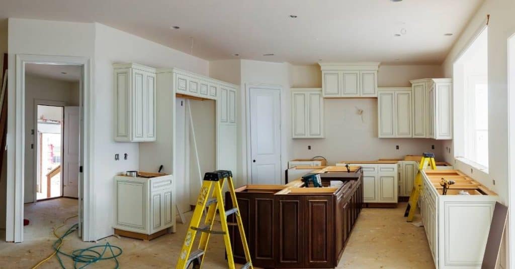 Kitchen with newly installed cabinets in various colors