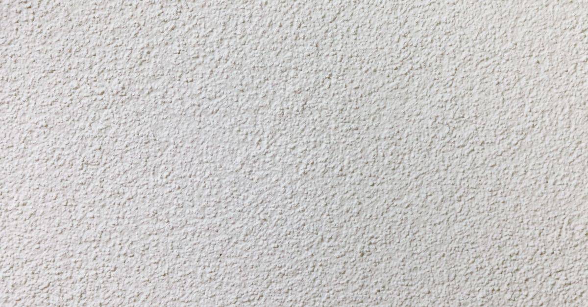close up of painted textured drywall surface