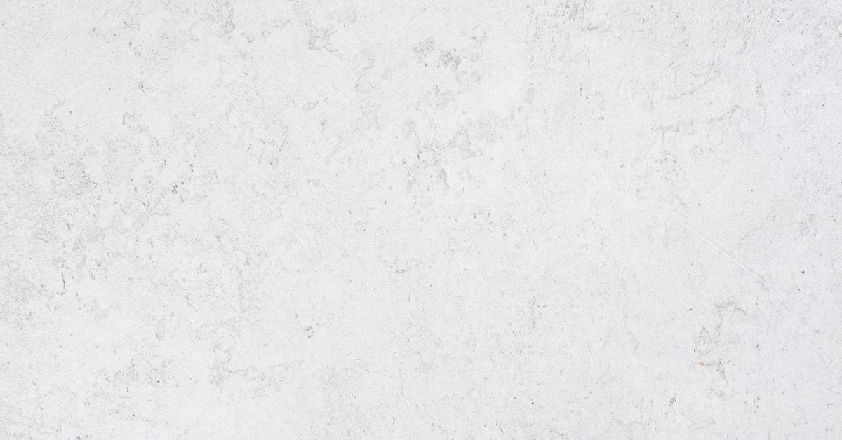 close up of white textured wall surface with slight roughness