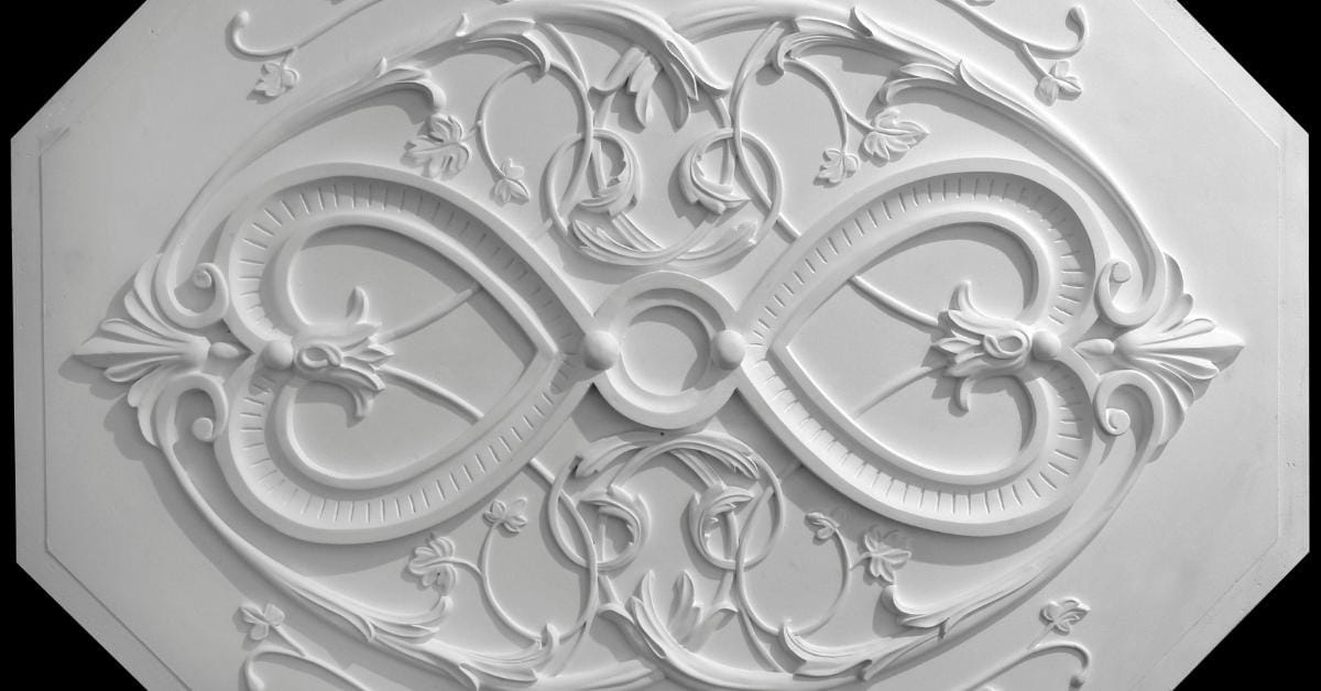Detailed ornate plaster ceiling medallion with floral patterns
