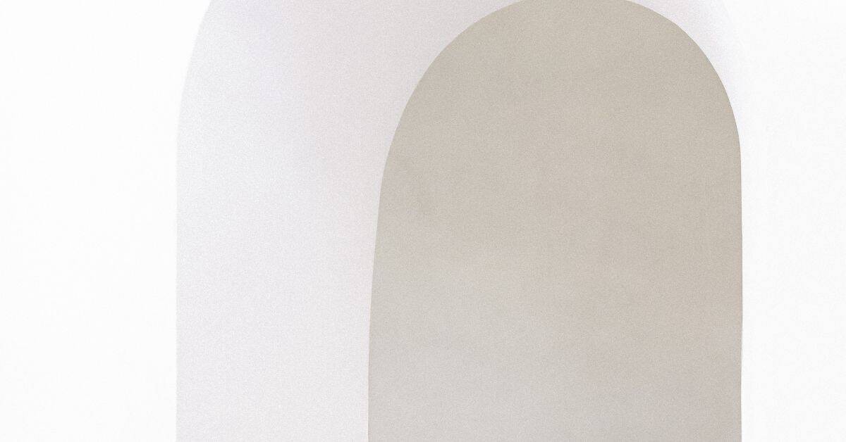 Smooth plastered archway with soft curved edges