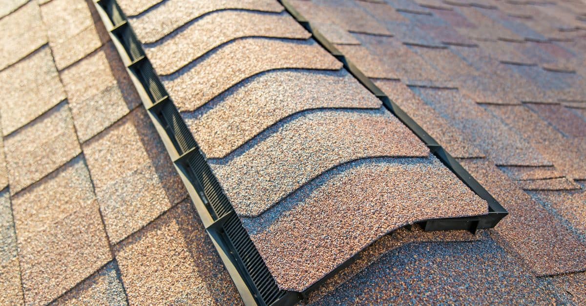 Close-up of asphalt shingle ridge vent on roof