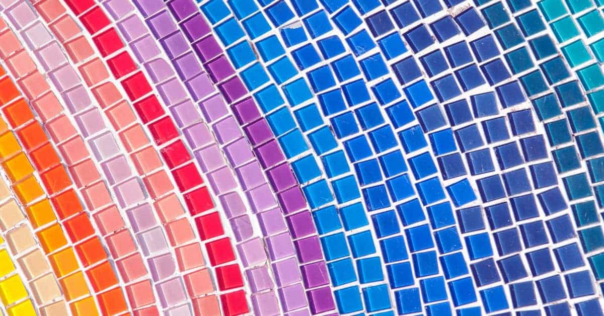 Colorful small square mosaic tiles with visible grout lines
