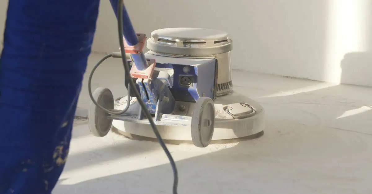 Concrete floor polishing machine on smooth concrete surface