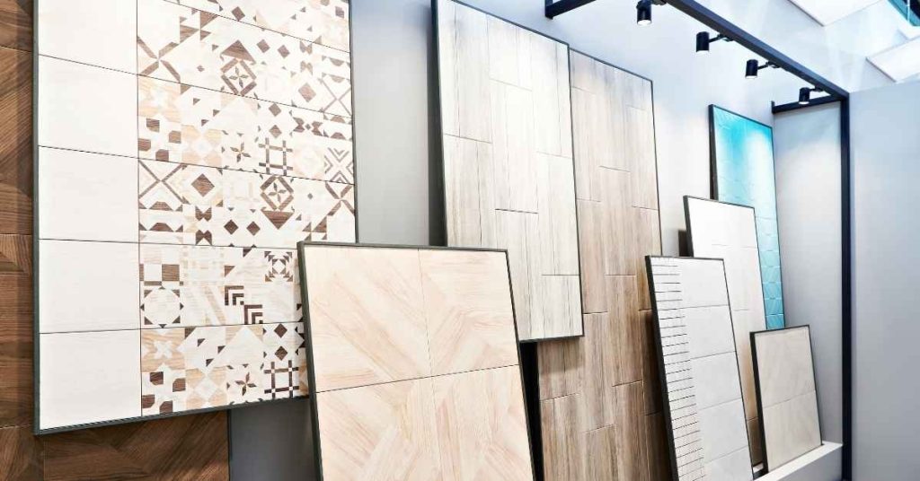 Various decorative and wood-effect wall tiles displayed vertically