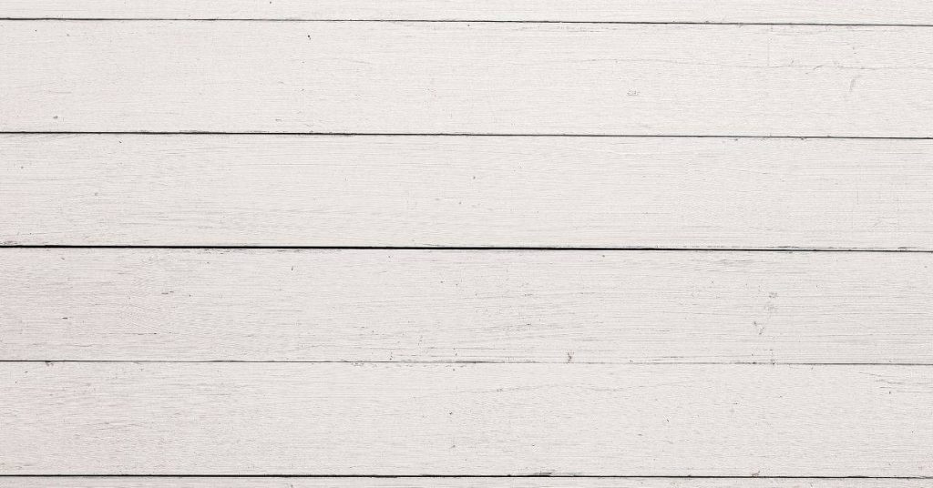 White painted horizontal wooden shiplap planks