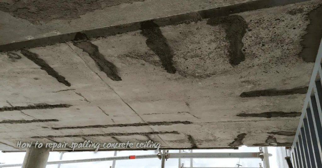 Concrete ceiling with dark patched spalling repair areas