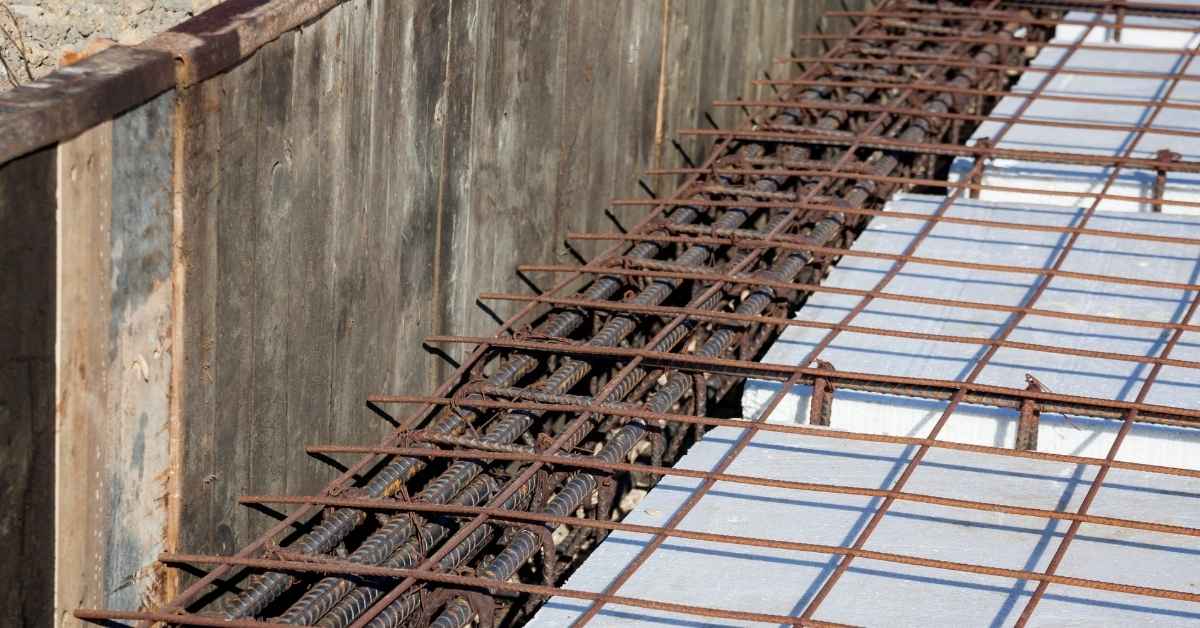 Steel rebar grid over foam insulation in concrete form