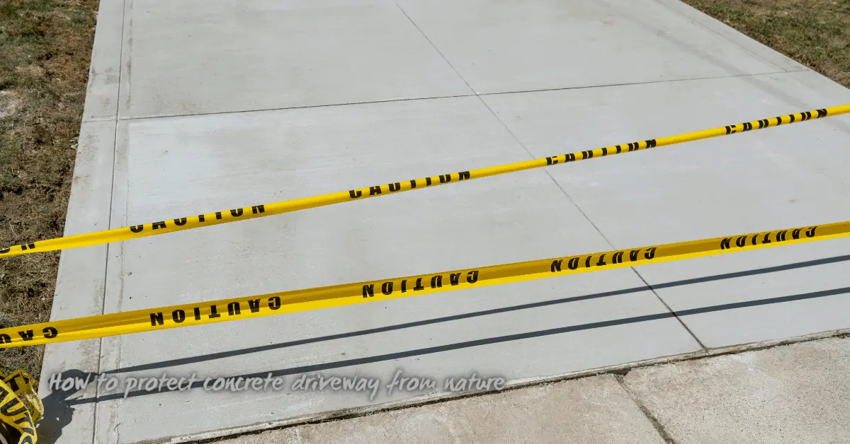 Fresh concrete driveway with yellow caution tape barrier