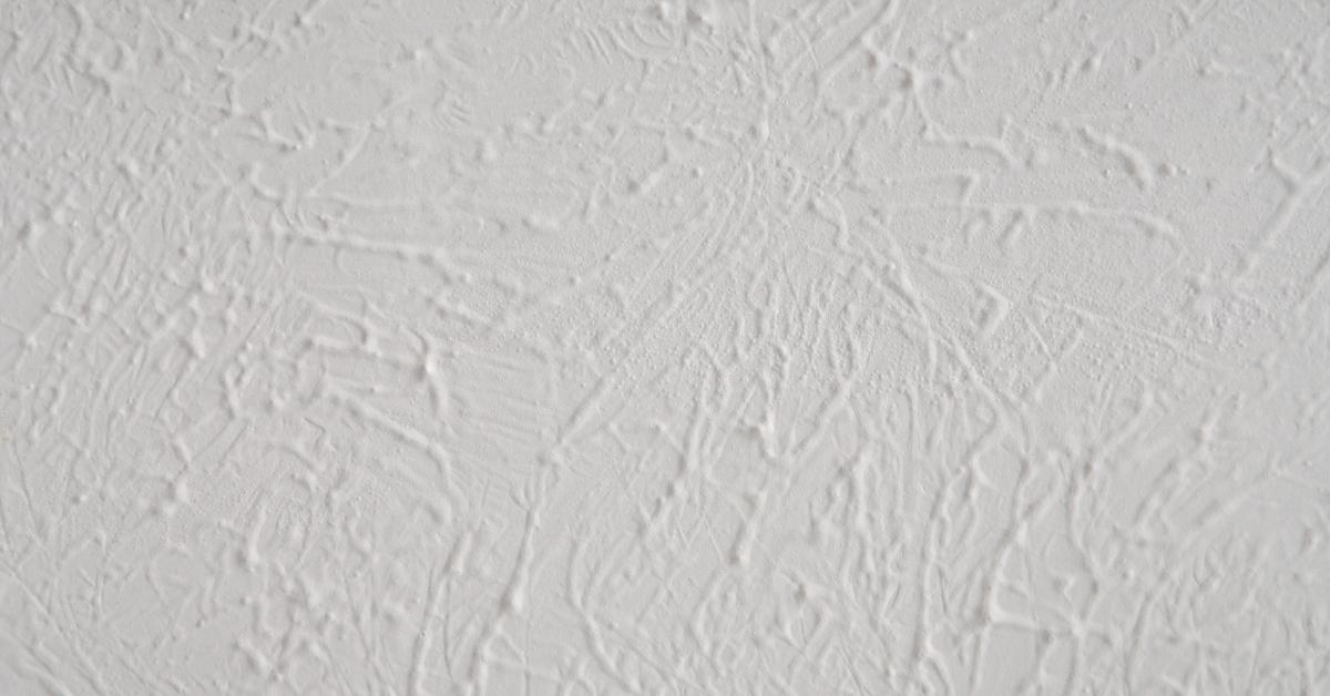 close-up of white textured plaster wall surface