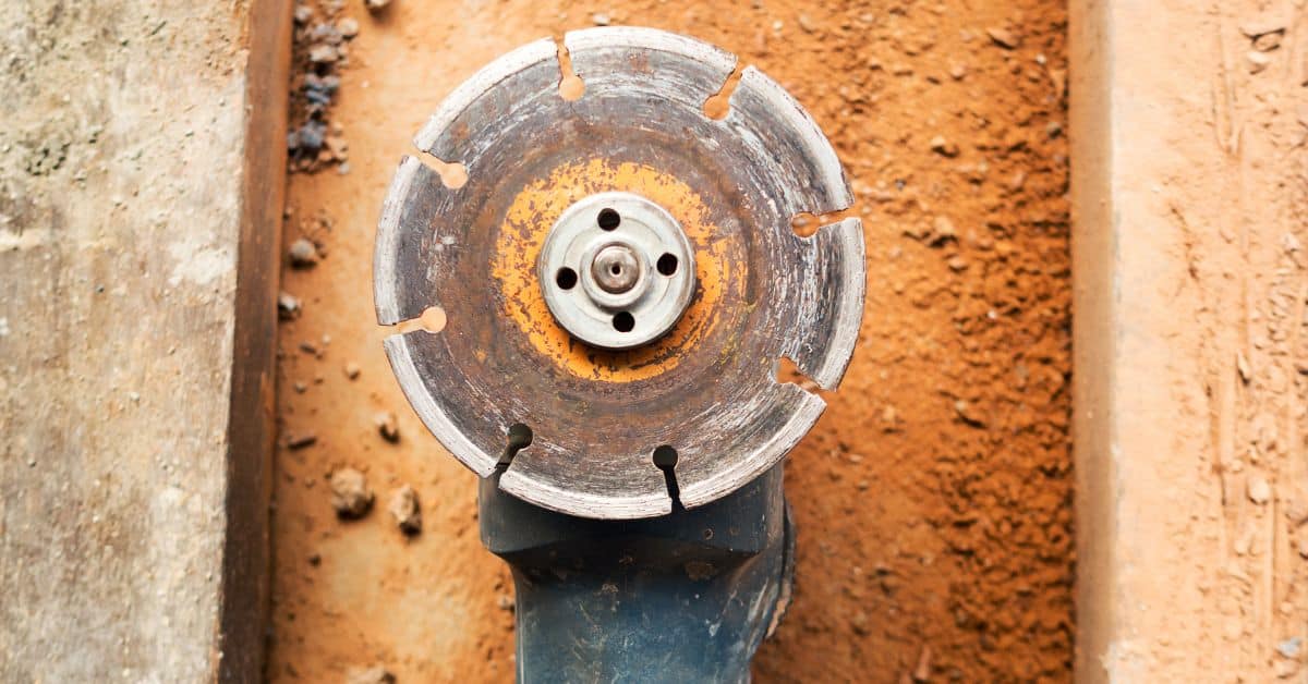 Close-up of angle grinder with cutting wheel attached
